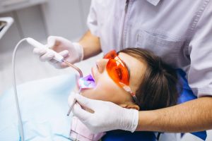 a women is getting dental treatment